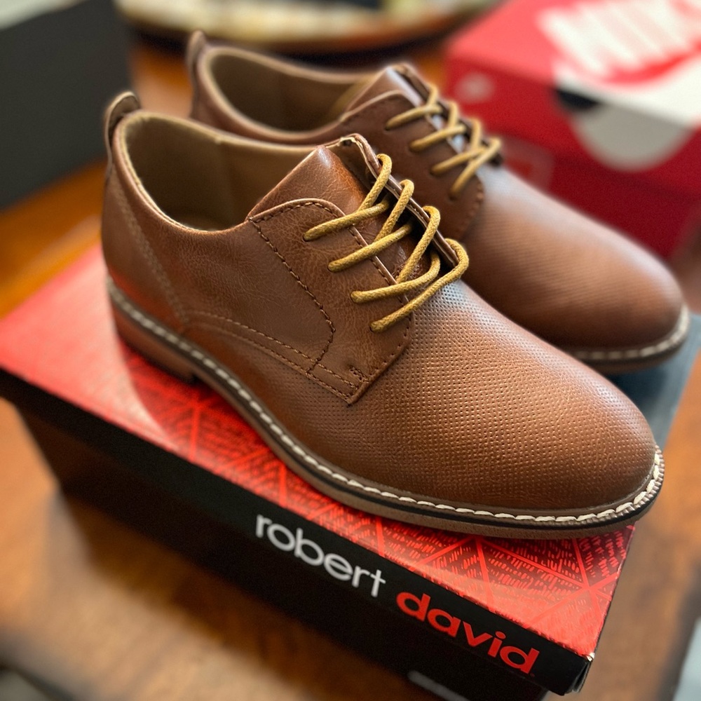 New brown dress shoes for a little boy